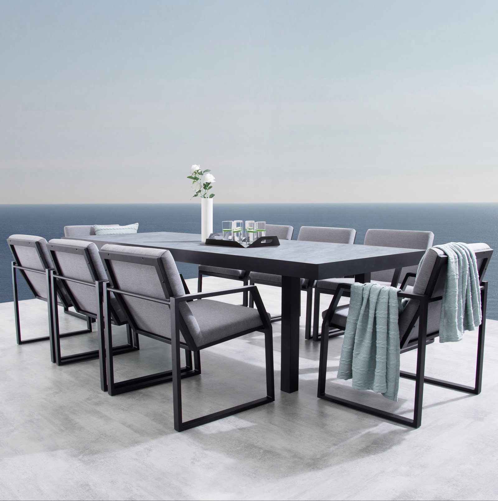Invini Black Large 9-piece Outdoor Ceramic Dining Set