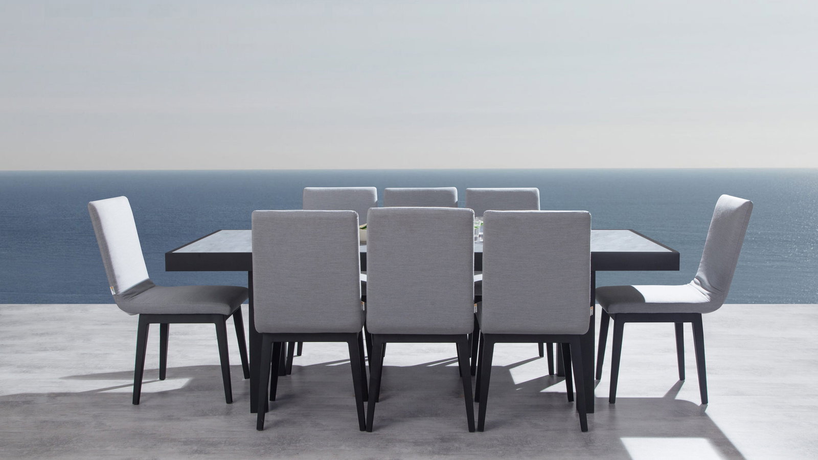 Invini Black 9-piece Outdoor Ceramic Dining Set With Kroes Chairs