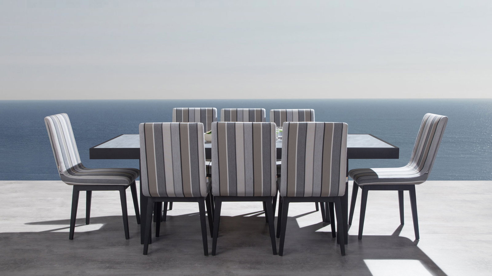 Invini Black 9-piece Outdoor Ceramic Dining Set With Kroes Chairs
